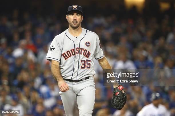 Justin Verlander of the Houston Astros walks to the dugout after pitching the fifth inning against the Los Angeles Dodgers in game six of the 2017...