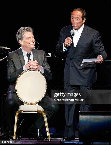 Producer/composer David Foster and singer Paul Anka perform during the "Hit Man: David Foster and Friends" concert at the Mandalay Bay Events Center...