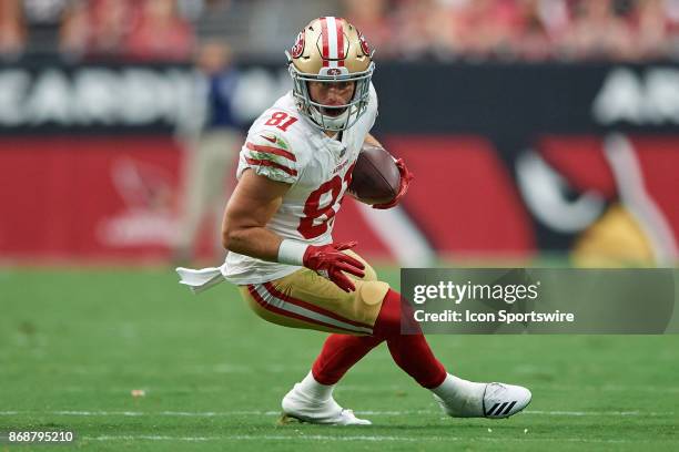 San Francisco 49ers wide receiver Trent Taylor runs with the football during the NFL game between the Arizona Cardinals and the San Francisco 49ers...