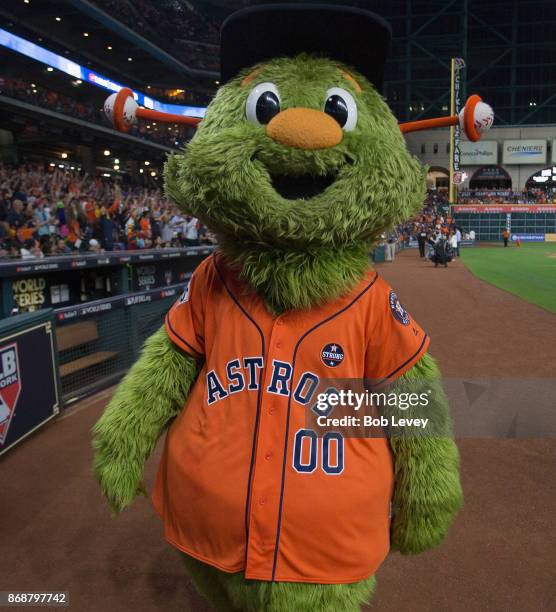 Houston Astros mascot Orbit and The Shooting Stars catapults t