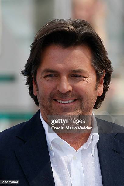 Thomas Anders smiles during the live broadcast of the TV Show 'ZDF Fernsehgarten' at the ZDF TV gardens on May 10, 2009 in Mainz, Germany.