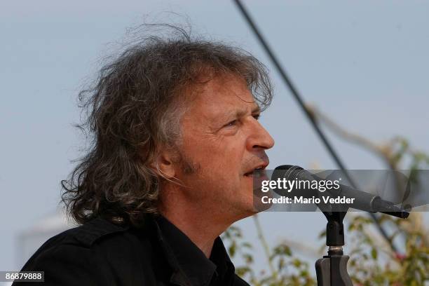 Wolfgang Niedecken of the German band BAP performs a song during the live broadcast of the TV Show 'ZDF Fernsehgarten' at the ZDF TV gardens on May...