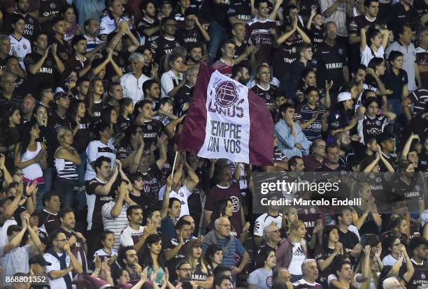 Fans of Lanus cheer for their team during a second leg match between Lanus and River Plate as part of the semifinals of Copa CONMEBOL Libertadores...