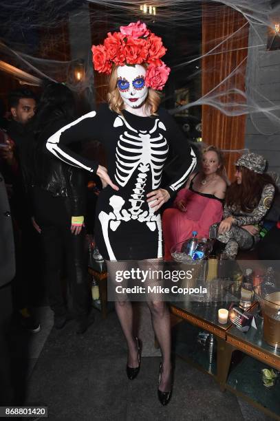 Heather Graham attends Heidi Klum's 18th Annual Halloween Party presented by Party City and SVEDKA Vodka at Magic Hour Rooftop Bar & Lounge at Moxy...