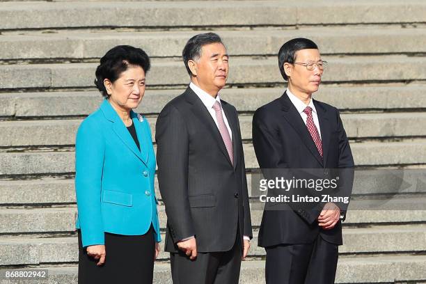 Chinese Vice Premier Liu Yandong, Wang Yang, Zhang Gaoli attend a welcoming ceremony for Russia's Prime Minister Dmitry Medvedev outside the Great...
