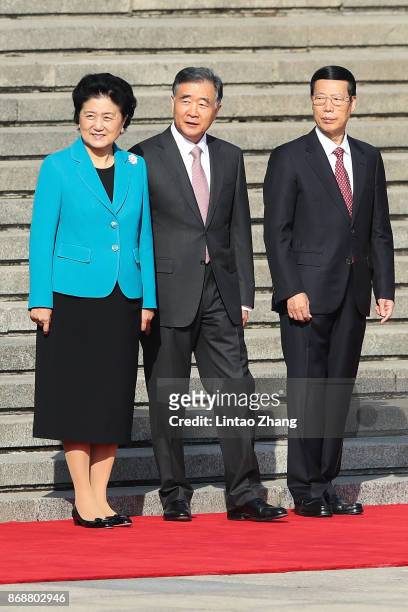 Chinese Vice Premier Liu Yandong, Wang Yang, Zhang Gaoli attend a welcoming ceremony for Russia's Prime Minister Dmitry Medvedev outside the Great...