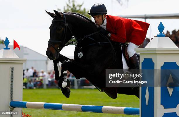 Harry Mead of Great Britain rides Midnight Dazzler during the show jumping at The Mitsubishi Motors Badminton Horse Trials in the HSBC FEI Classics...