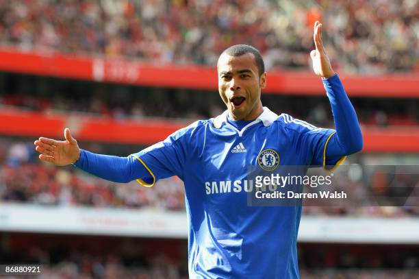 Ashley Cole of Chelsea celebrates after his cross was deflected in by Kolo Toure of Arsenal for the third goal of the game during the Barclays...
