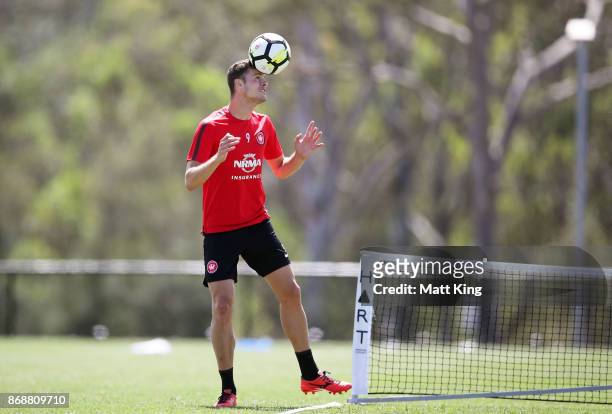 Oriol Riera of the Wanderers heads the ball during a Western Sydney Wanderers A-League training session at Blacktown International Sportspark on...