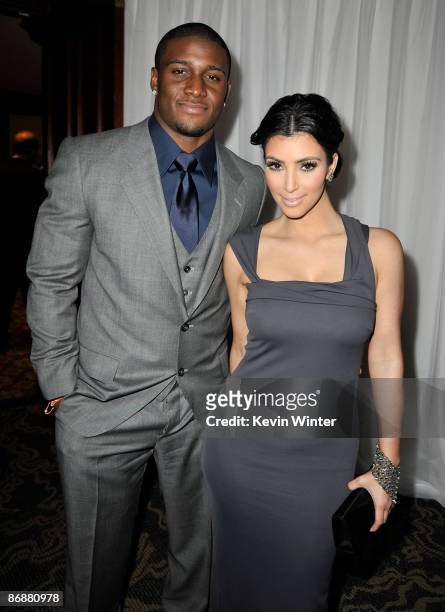 Player Reggie Bush and TV personality Kim Kardashian attend the 16th Annual Race To Erase MS cocktail reception co-chaired by Nancy Davis and Tommy...
