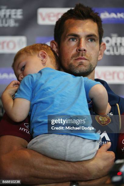 Brisbane Lions recruit Luke Hodge holds son Leo when speaking to media during a Brisbane Lions AFL media opportunity at WRAP on Southbank on November...