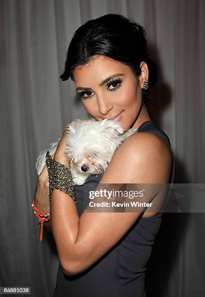 Personality Kim Kardashian attends the 16th Annual Race To Erase MS cocktail reception co-chaired by Nancy Davis and Tommy Hilfiger at the Hyatt...