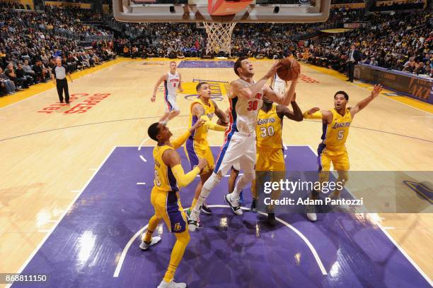 Jon Leuer of the Detroit Pistons goes to the basket against the Los Angeles Lakers on October 31, 2017 at STAPLES Center in Los Angeles, California....