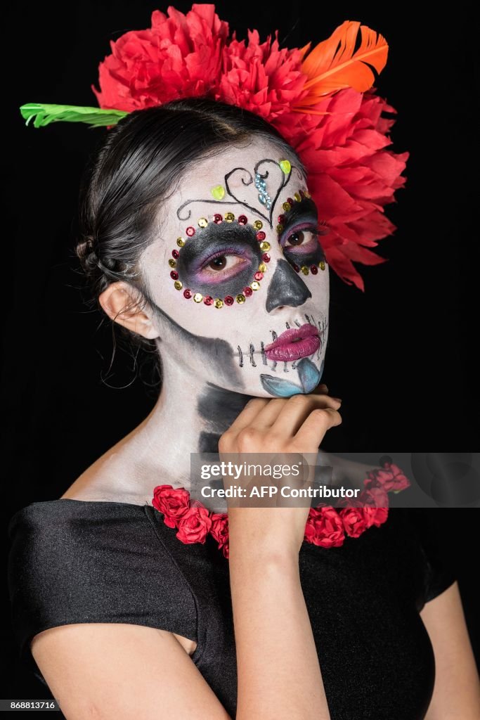 MEXICO-DAY-OF-THE-DEAD-CATRINAS