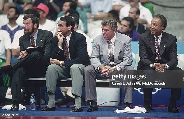 Summer Olympics Men's Basketball: USA coaches assistant P.J. Carlesimo, assistant Mike Krzyzewski, coach Chuck Daly and assistant Lenny Wilkens on...