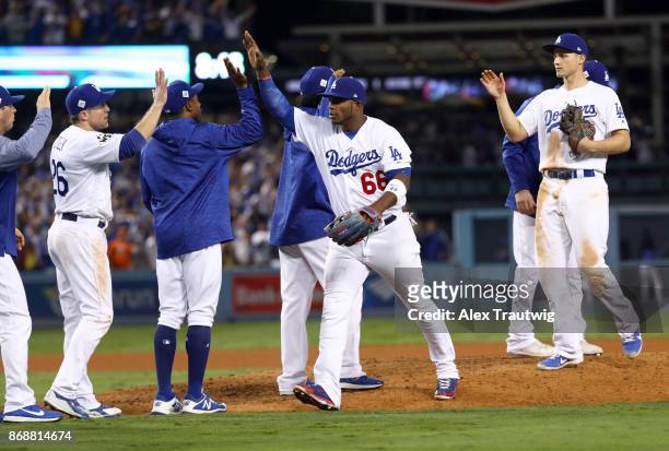 Yasiel Puig of the Los Angeles Dodgers celebrates with teammates after Game 6 of the 2017 World Series against the Houston Astros at Dodger Stadium...