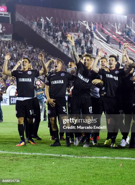 Players of Lanus celebrate after winning a second leg match between Lanus and River Plate as part of the semifinals of Copa CONMEBOL Libertadores...