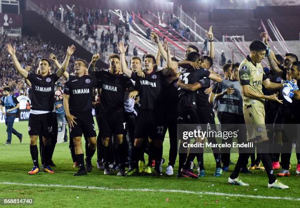 Players of Lanus celebrate after winning a second leg match between Lanus and River Plate as part of the semifinals of Copa CONMEBOL Libertadores...