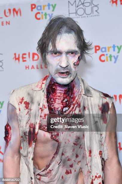 Thomas Hayo attends Heidi Klum's 18th annual Halloween Party presented by Party City at the Magic Hour Rooftop Bar & Lounge on October 31, 2017 in...