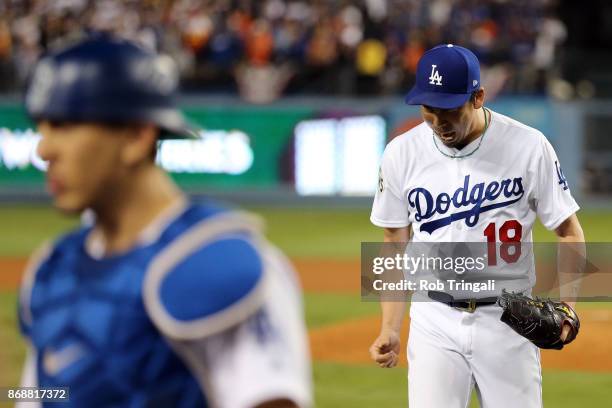 Kenta Maeda of the Los Angeles Dodgers reacts getting the final out of the seventh inning during Game 6 of the 2017 World Series against the Houston...