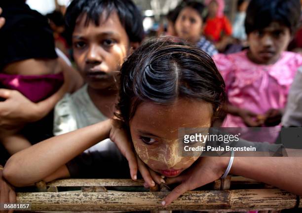 Burmese children wait patiently for their malaria test results at special clinic for malaria on May 4, 2009 in Sittwe, Arakan state, Myanmar . The...