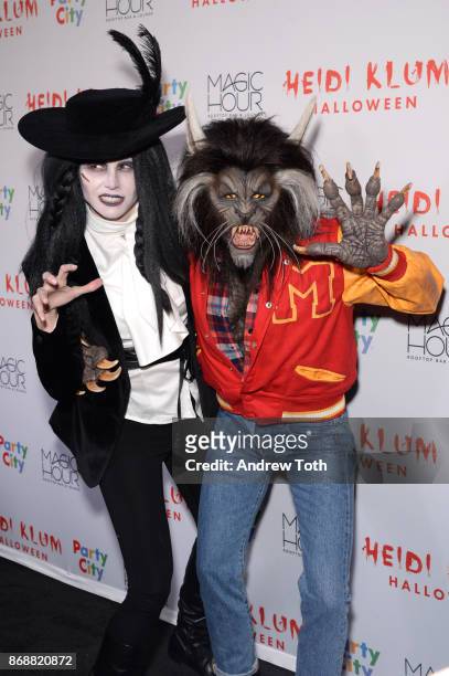 Desiree Gruber and Heidi Klum attend Heidi Klum's 18th annual Halloween party at Magic Hour Rooftop Bar & Lounge on October 31, 2017 in New York City.
