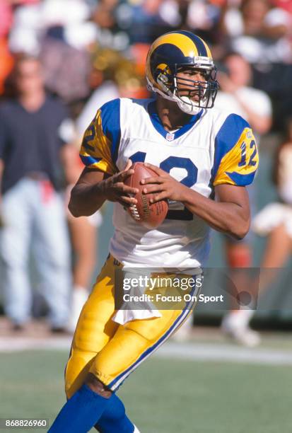 Tony Banks of the St. Louis Rams looks to pass against the San Francisco 49ers during an NFL football game October 12, 1997 at Candlestick Park in...