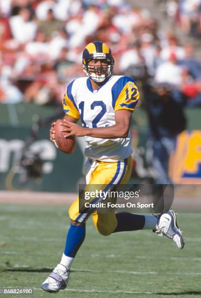 Tony Banks of the St. Louis Rams looks to pass against the San Francisco 49ers during an NFL football game October 12, 1997 at Candlestick Park in...