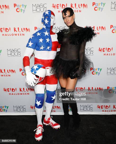 David Kirsch and Schynaider M. G. Attend Heidi Klum's 18th annual Halloween Party presented by Party City at the Magic Hour Rooftop Bar & Lounge on...