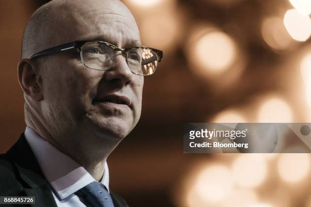 Bruce Weller, managing director of project finance in Asia Pacific at BNP Paribas SA, speaks during the FT-AIIB Summit in Hong Kong, China, on...