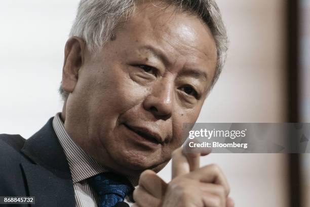 Jin Liqun, president of the Asian Infrastructure Investment Bank , speaks during the FT-AIIB Summit in Hong Kong, China, on Wednesday, Nov. 1, 2017....