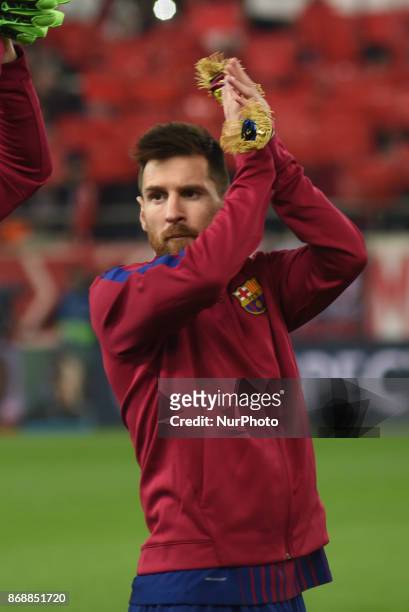 Barcelona's Argentinian forward Lionel Messi reacts during the UEFA Champions League group D football match between FC Barcelona and Olympiakos FC at...