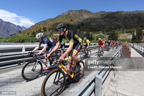 Brad Evans of Dunedin, Powernet , and Louis Crosby of Auckland, Blindz Direct make their way over the bridge towards Frankton during stage 3, from...