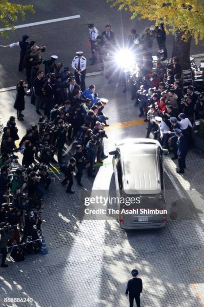 Police vehicle carrying suspect Takahiro Shiraishi is seen on departure at Takao Police Station as he is transferred to prosecutors on November 1,...