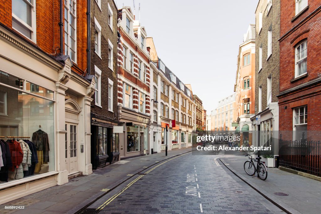 Street with shops and cafes in Marylbone, London, UK