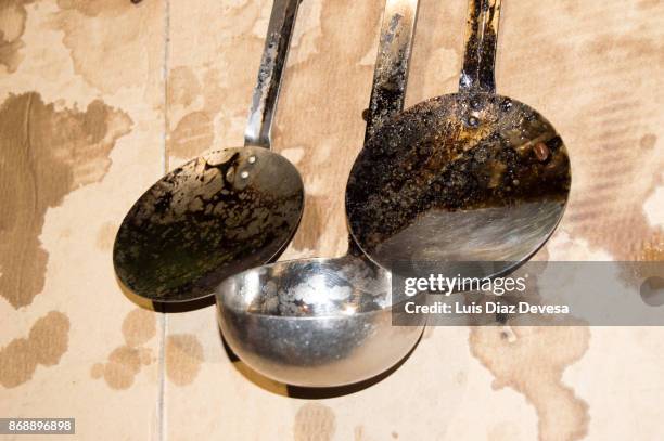 kitchen utensils - straining spoon stock pictures, royalty-free photos & images