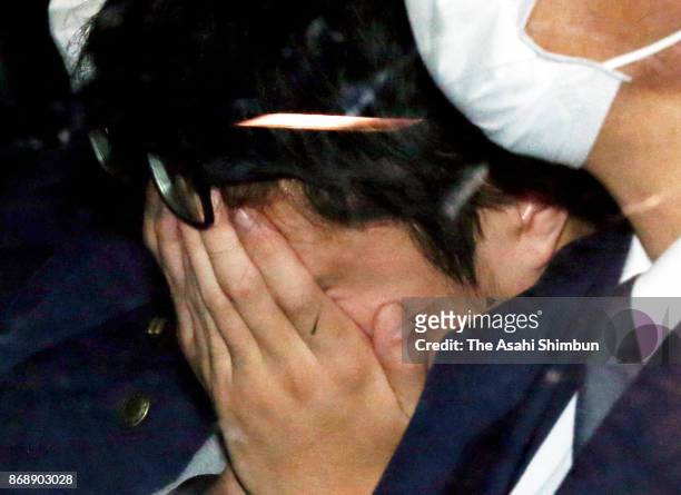 Suspect Takahiro Shiraishi covering his face is seen on arrival at Takao Police Station on November 1, 2017 in Hachioji, Tokyo, Japan. Shiraishi,...