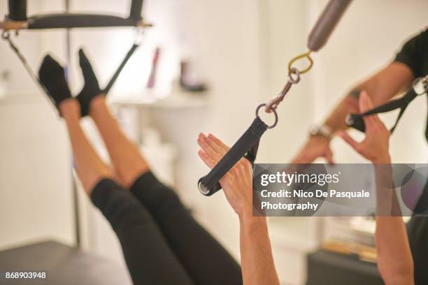 pilates studio - pilates equipment stock pictures, royalty-free photos & images