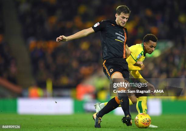 Ryan Bennett of Wolverhampton Wanderers and Josh Murphy of Norwich City during the Sky Bet Championship match between Norwich City and Wolverhampton...