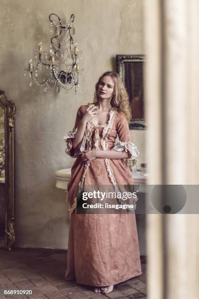 18th century woman in a castle - victorian dress stock pictures, royalty-free photos & images