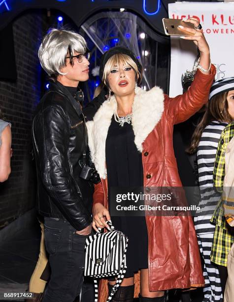 Fernando Garcia and actress Jackie Cruz are seen during Heidi Klum's 18th Annual Halloween Party at Magic Hour Rooftop Bar & Lounge on October 31,...