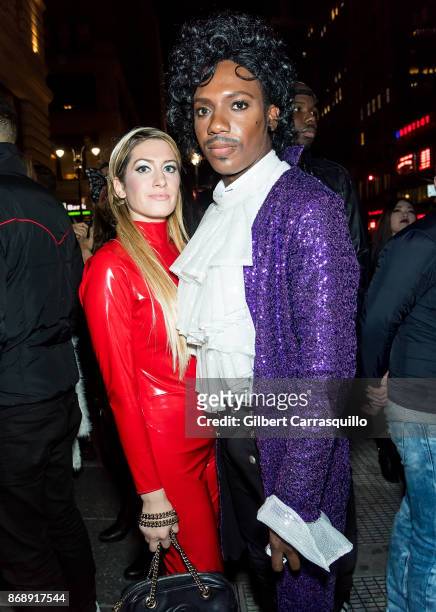Elizabeth Wagmeister and Carlos Greer of Page Six TV are seen during Heidi Klum's 18th Annual Halloween Party at Magic Hour Rooftop Bar & Lounge on...