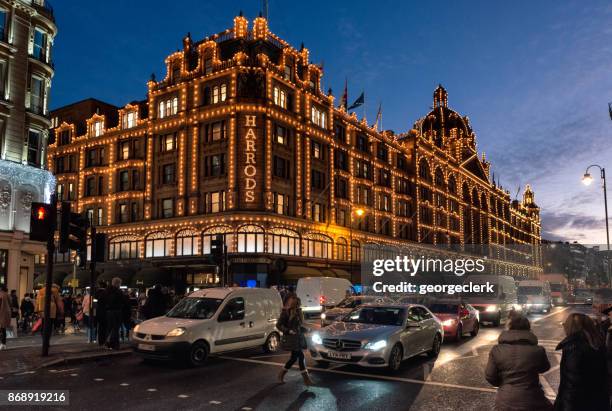 harrods of london at dusk - harrods stock pictures, royalty-free photos & images