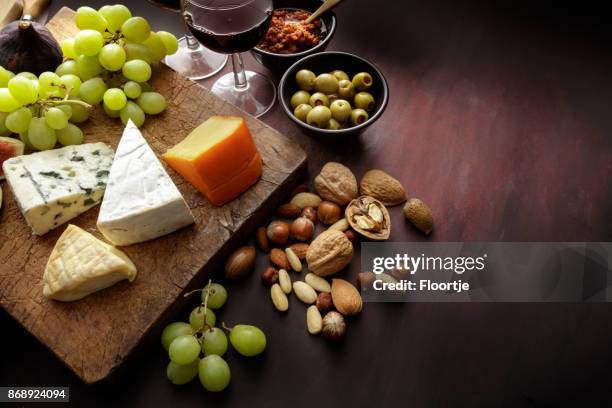 delicatessen: cheese board still life - roquefort stock pictures, royalty-free photos & images