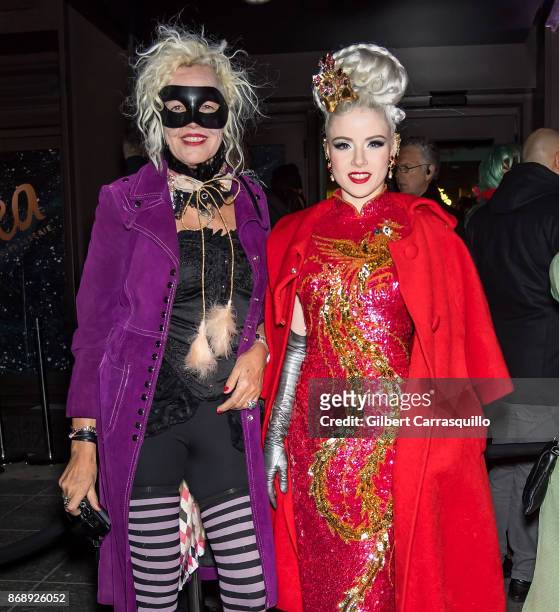 Photographer Ellen von Unwerth and guest are seen during Heidi Klum's 18th Annual Halloween Party at Magic Hour Rooftop Bar & Lounge on October 31,...