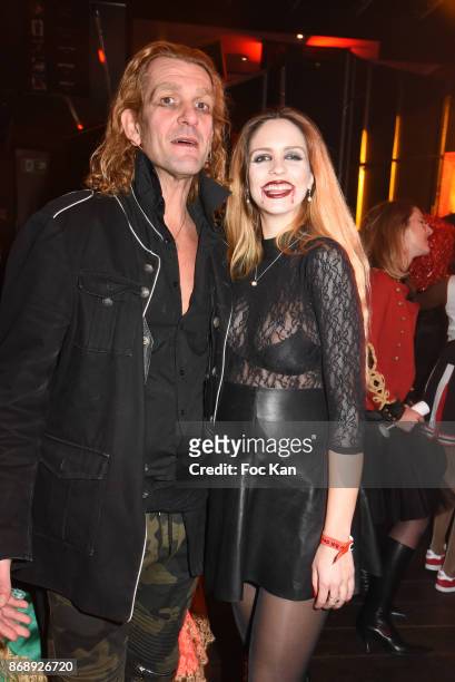 Photographer Ale de Basseville and Egla Harxhi attend the Bal des Vampires 2017 at Pavillon Champs Elysees on October 31, 2017 in Paris, France.