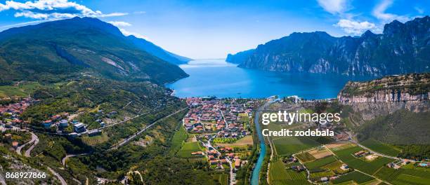 lake of garda panorama, trentino, italy - arco alto adige stock pictures, royalty-free photos & images