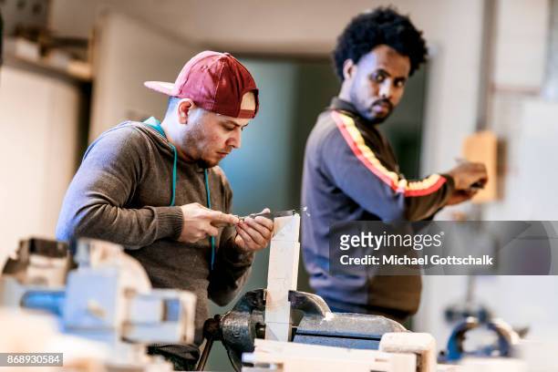 Berlin, Germany Refugee work at arrivo excercise workshop of Berlin chamber of crafts on October 01, 2017 in Berlin, Germany.