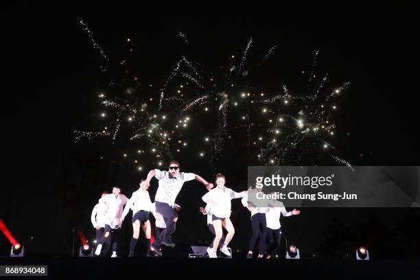 Performers on stage to celebrate 100 days to go and the PyeongChang 2018 Winter Olympics torch during a torch relay on November 1, 2017 in Incheon,...
