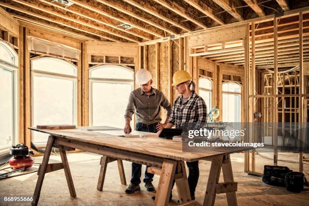 woman architect - house construction frame stock pictures, royalty-free photos & images
